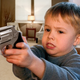 Image for article titled Exhausted Parents Struggling To Limit Child’s Time Using Gun